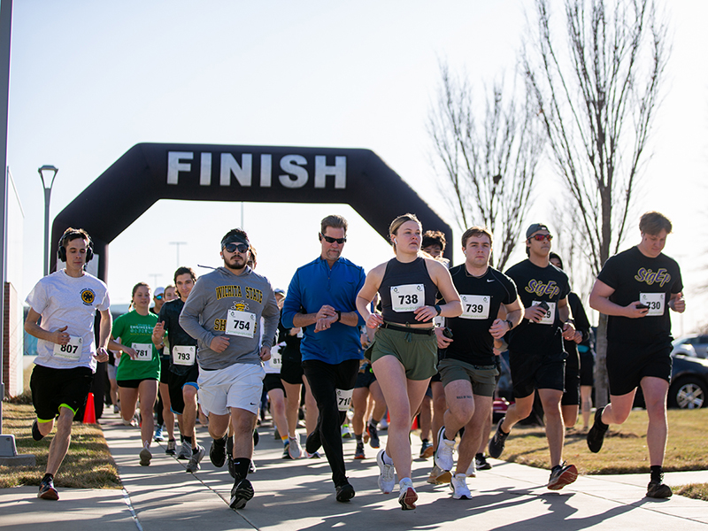 Several runners participate in a 5K