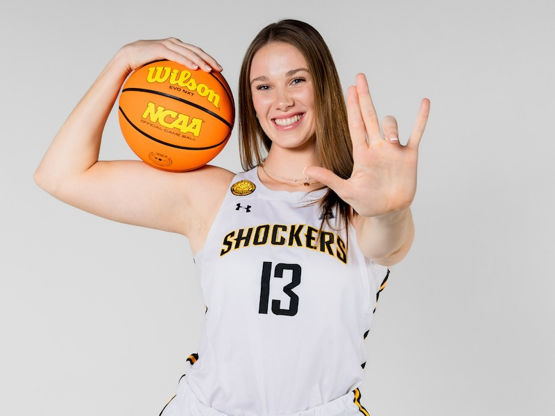 Shocker athlete with basketball
