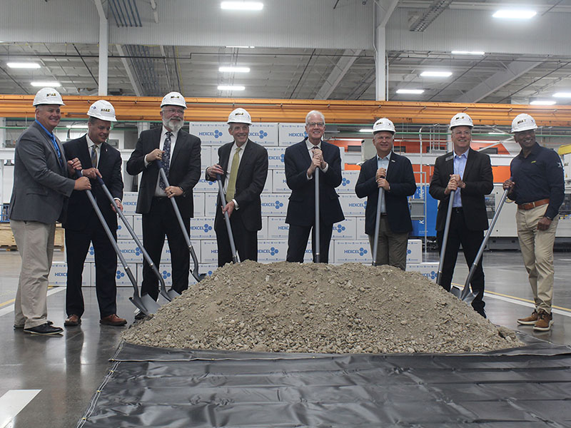 Representatives from Wichita Sate, Hexcel and the state of Kansas assemble to perform a ceremonial groundbreaking. 