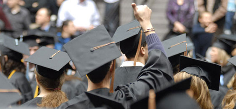 Students wearing graduation hats