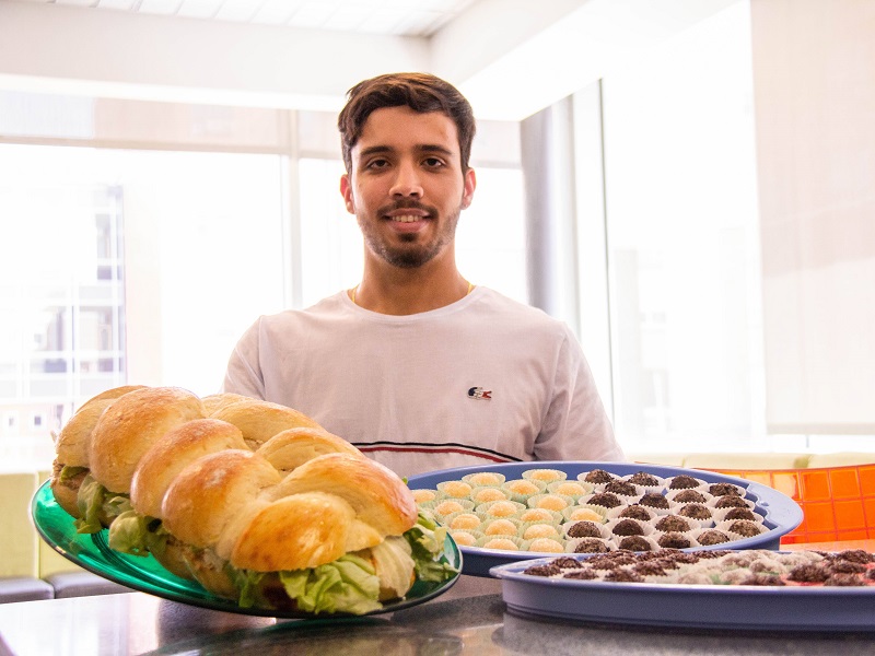 Felipe support family by selling food from native country