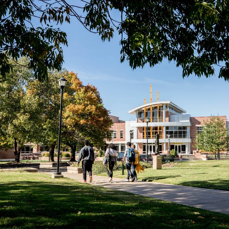 students walking towards the Rhatigan Student Center