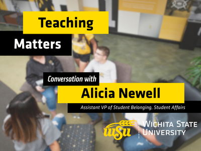 students sitting in chairs talking at the student center