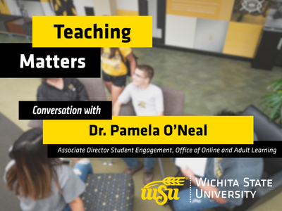 students sitting in chairs talking at the student center