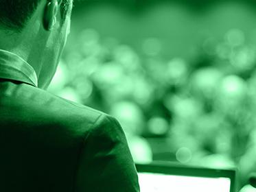 A speaker talking to an audience