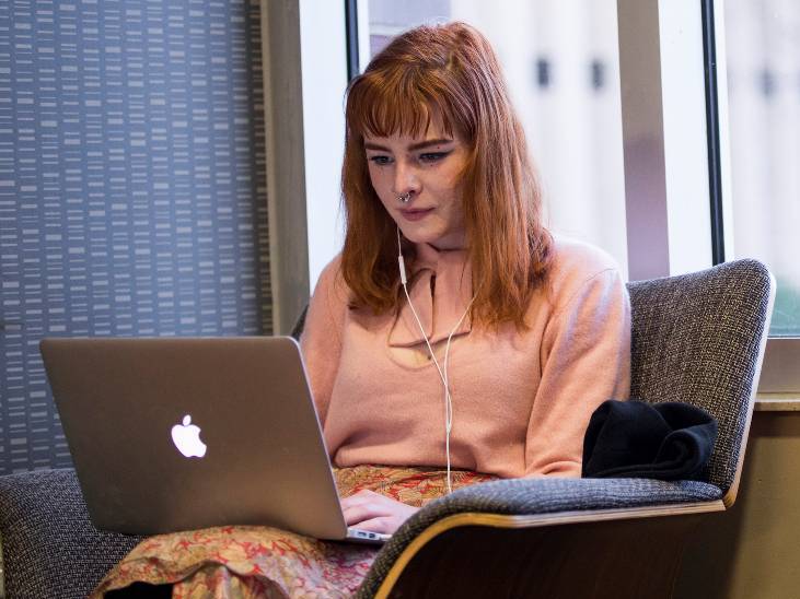 Girl on laptop.