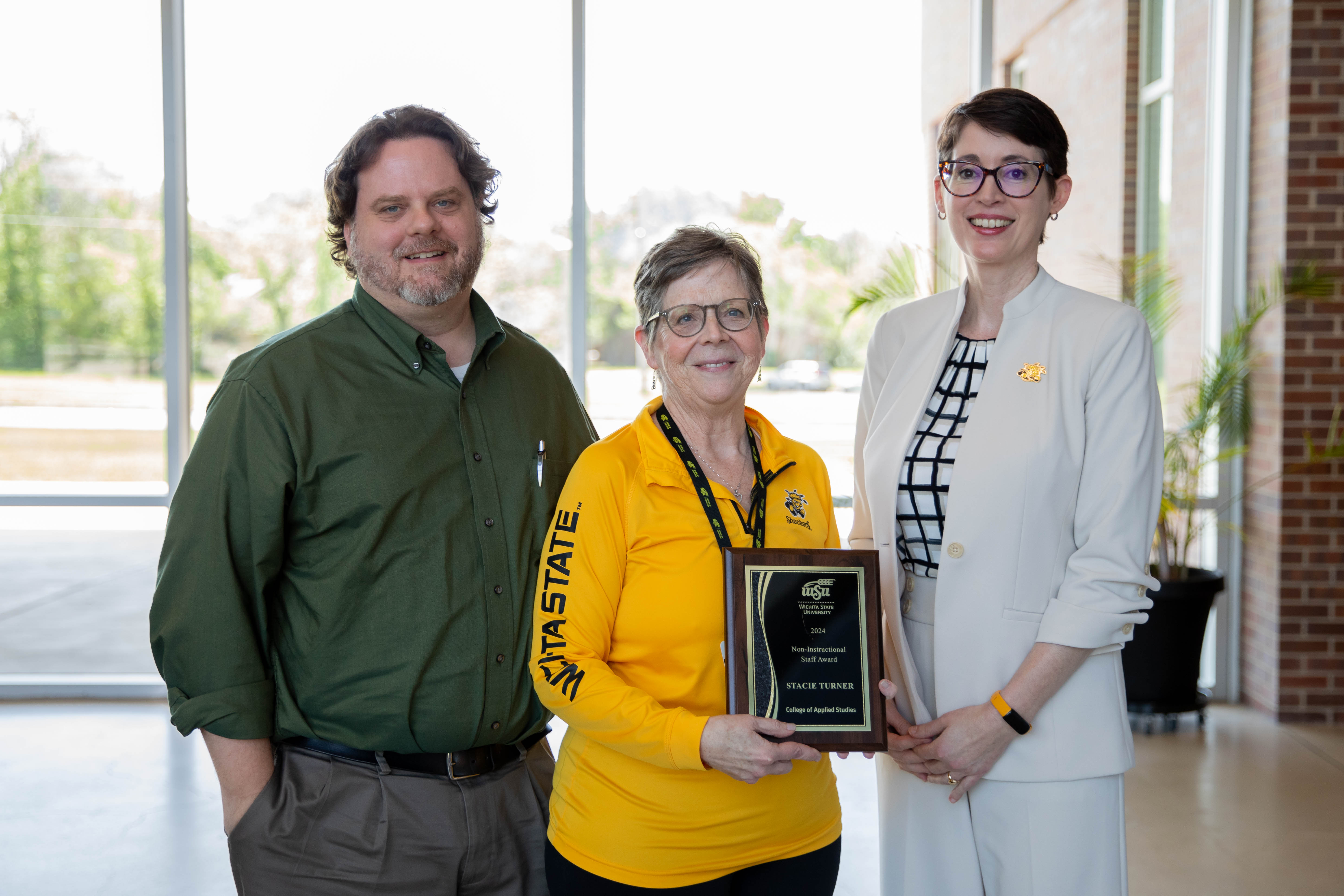 SOE Chair, Dr. Aaron Rife, SOE Office Coordinator, Stacie Turner and CAS Dean, Dr. Jennifer Friend