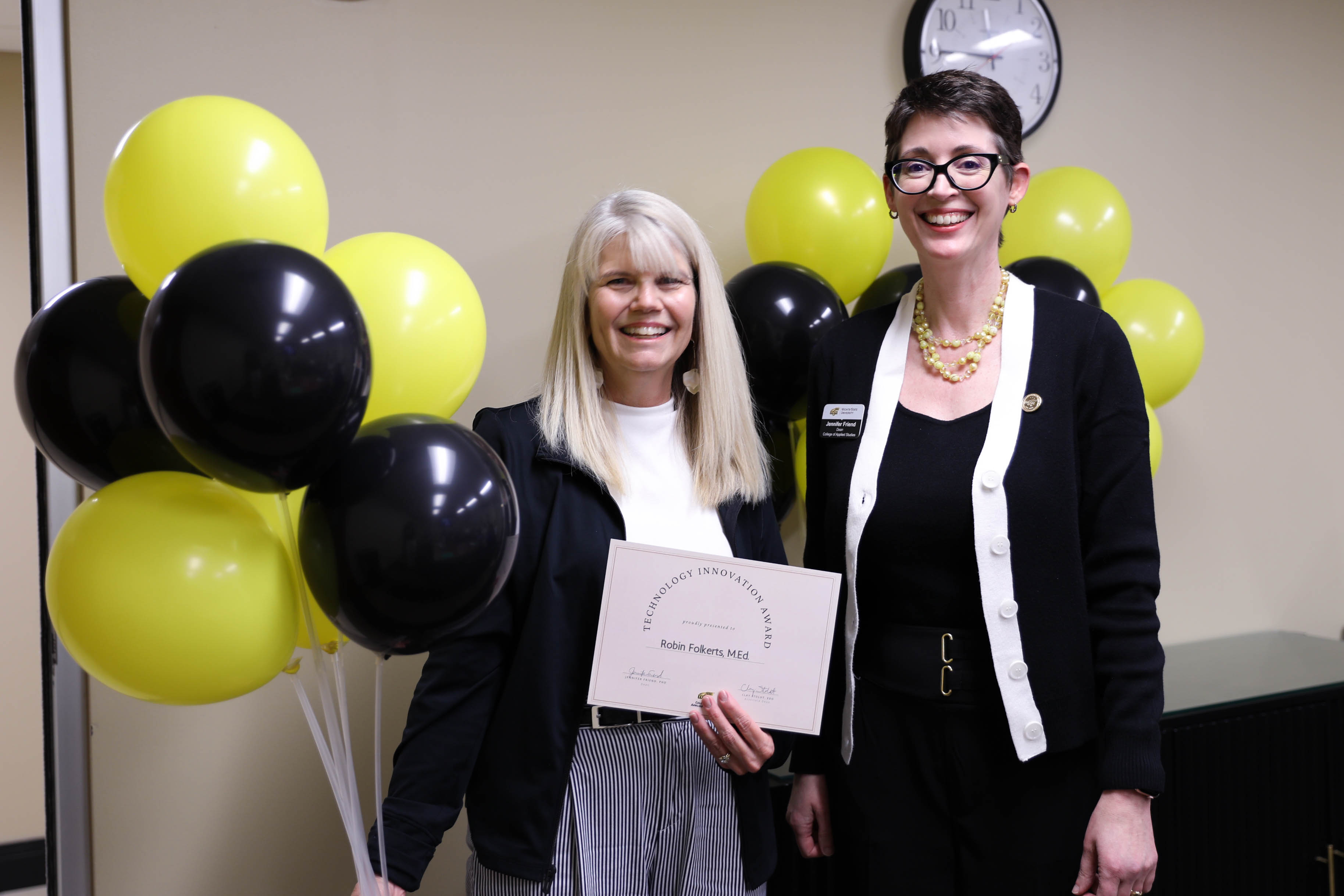 Robert Folkerts and Dean Jennifer Friend 