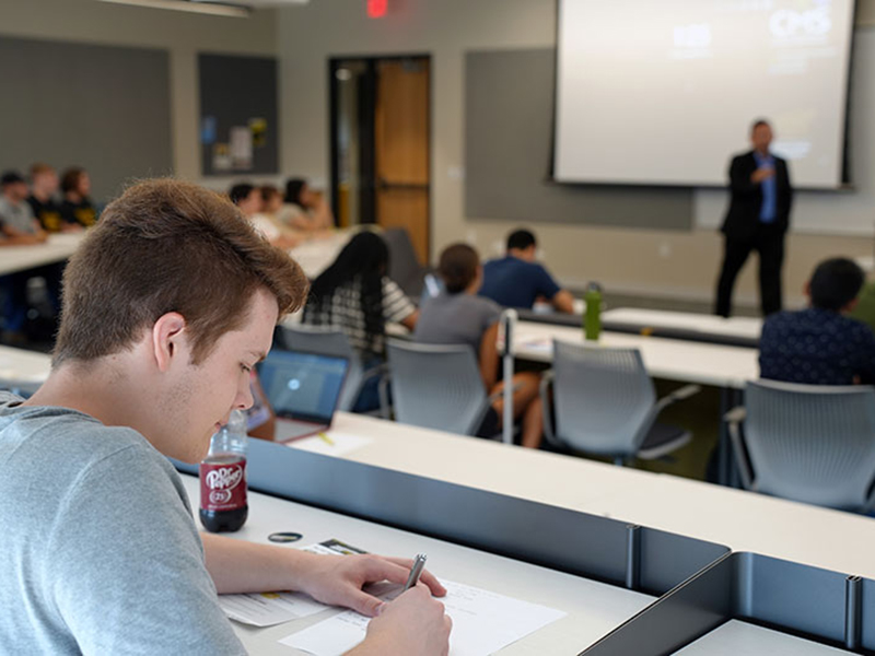 Students working in class in Woolsey Hall