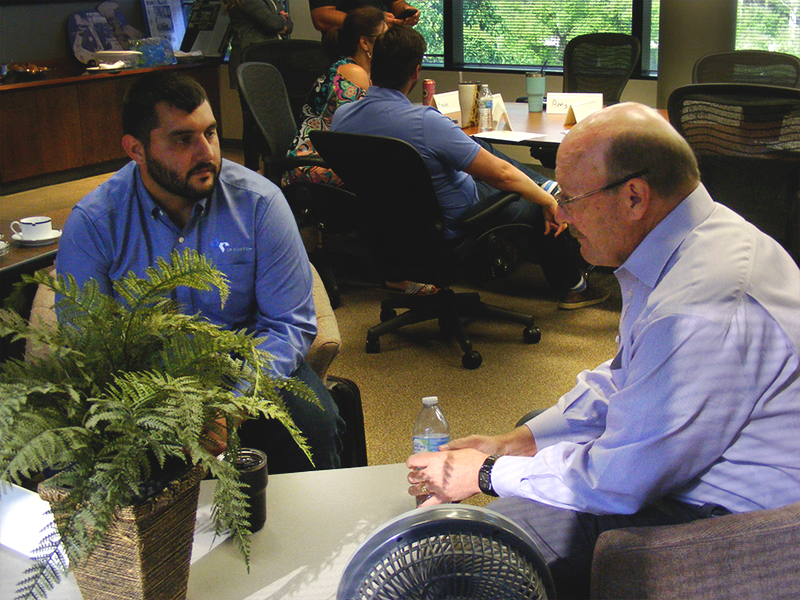 a mentor and mentee chatting