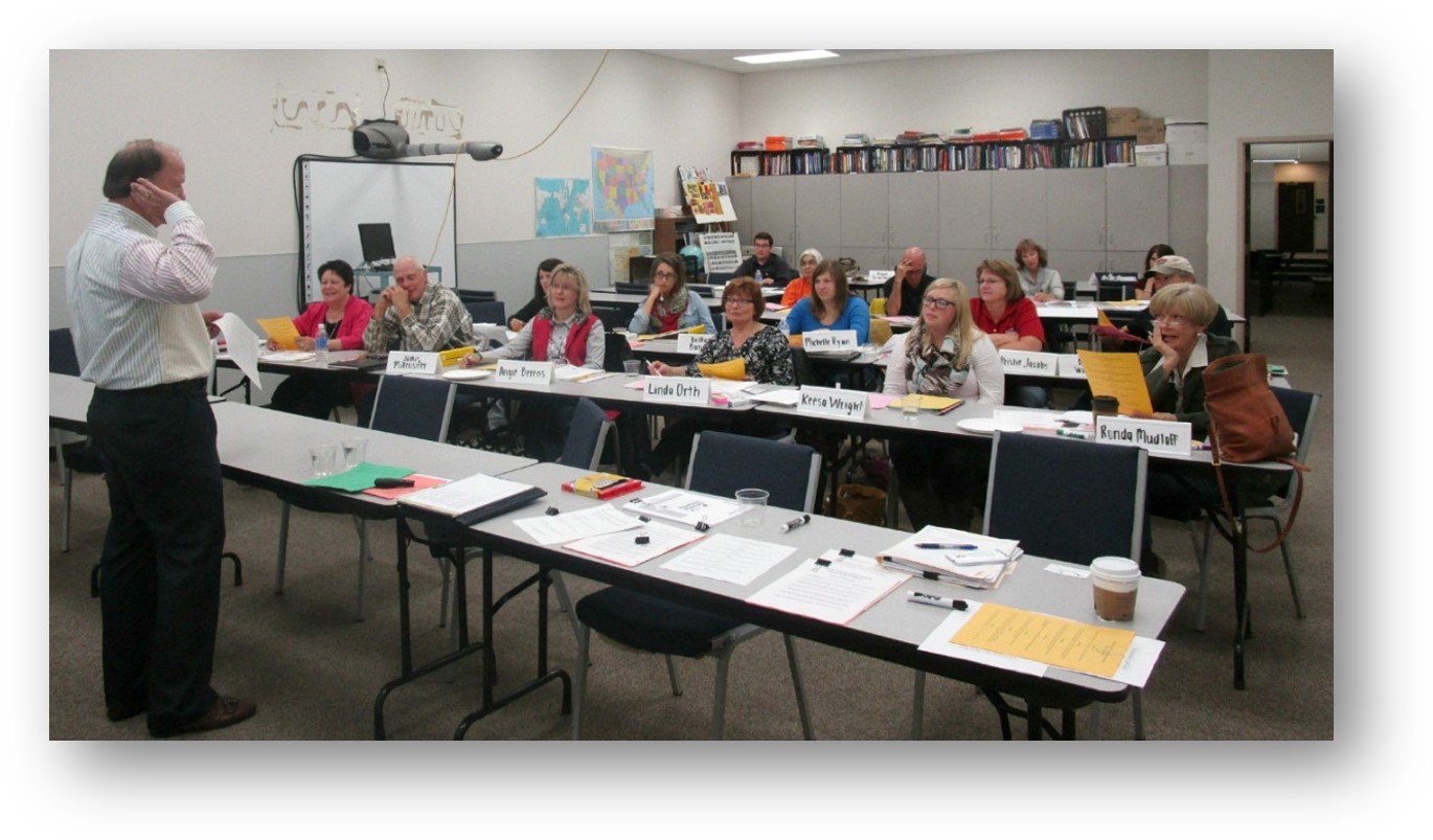 Participants from the Fall 2014 Growing Rural Business Training in Colby listening to the trainer