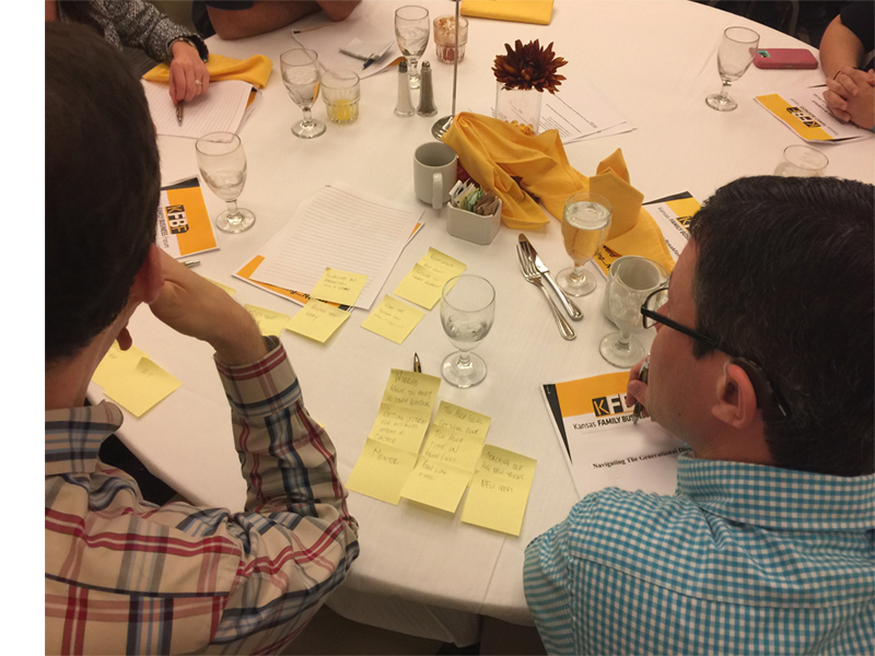 Kansas Family Business Forum members taking notes