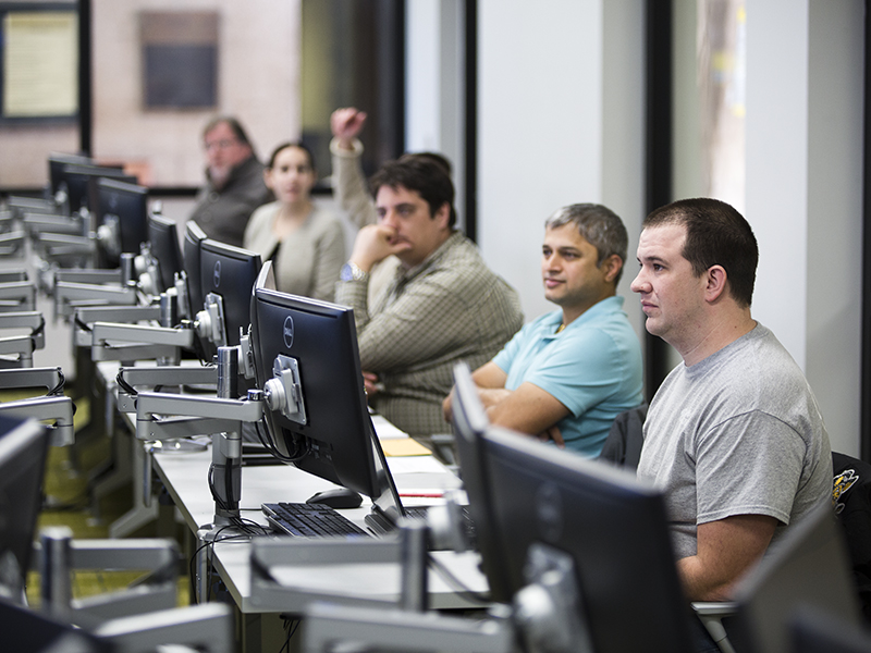 Students gather in a trading center classroom