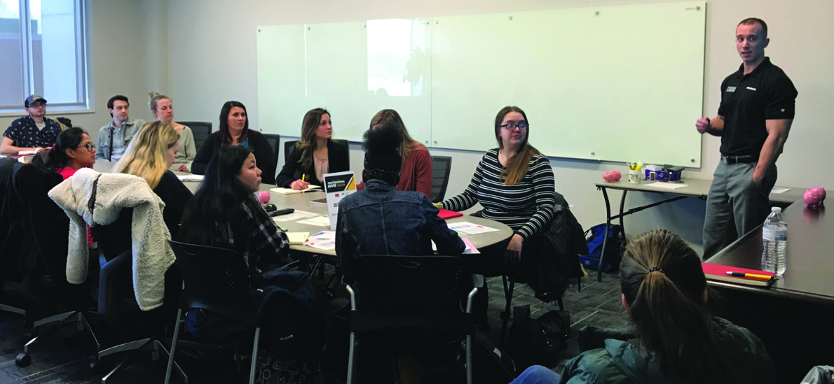 Students listen to a guest speaker during a Professional Edge session.