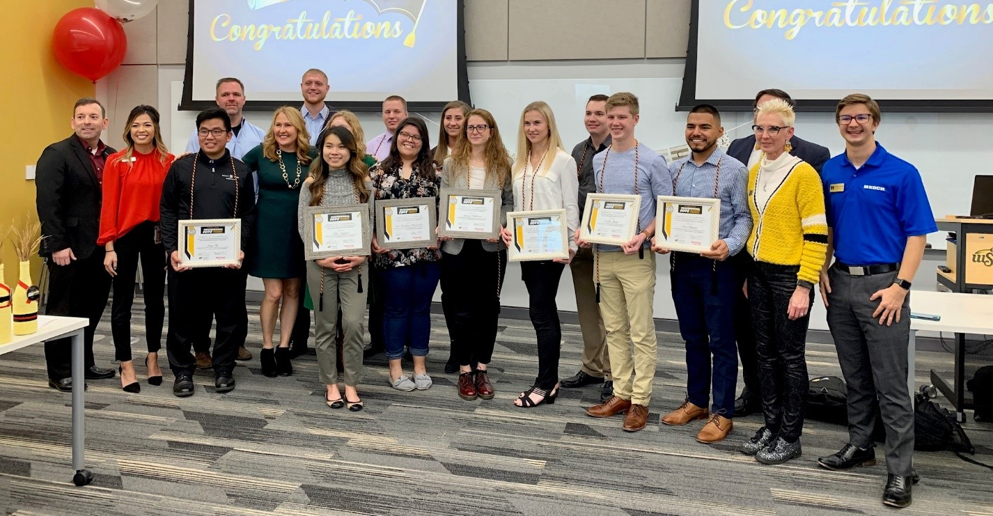 Students are presented with certificates and ropes following completion of the Professional Edge program.