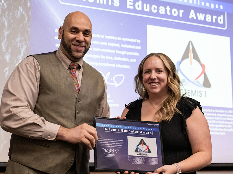Kristyn Waits with the Artemis Educator Award from NASA SUITS in 2024
