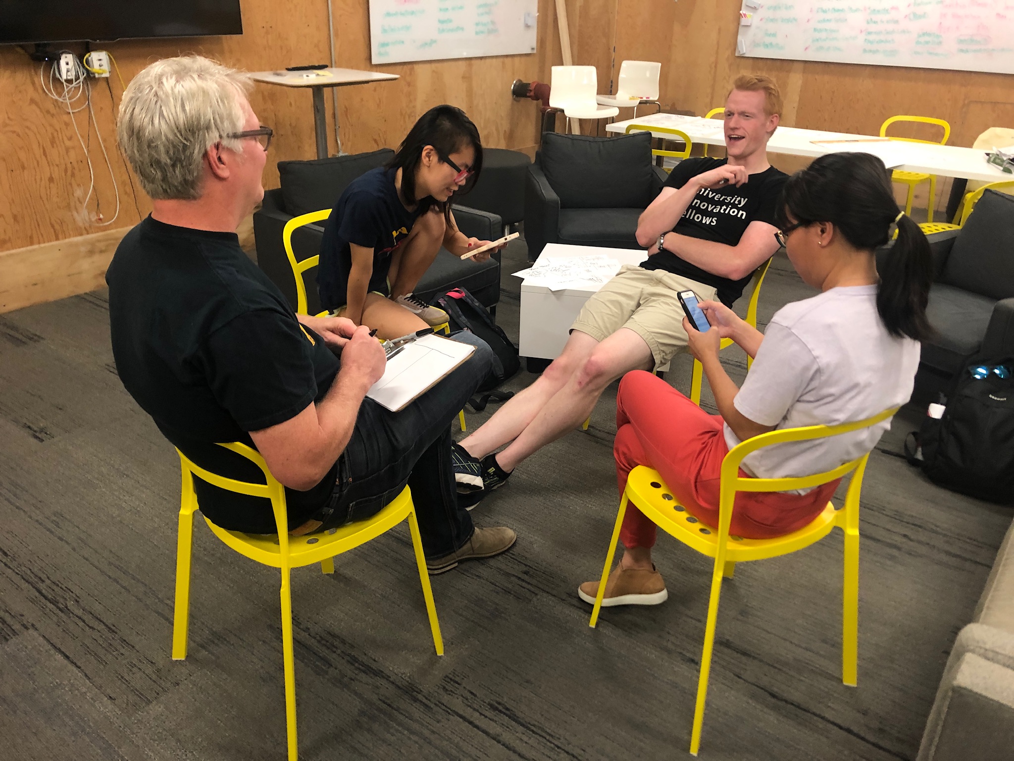 Small group of students and professor