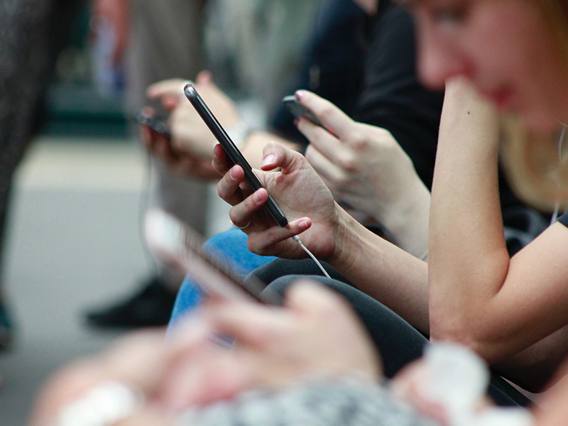 Young female looking at cellphone