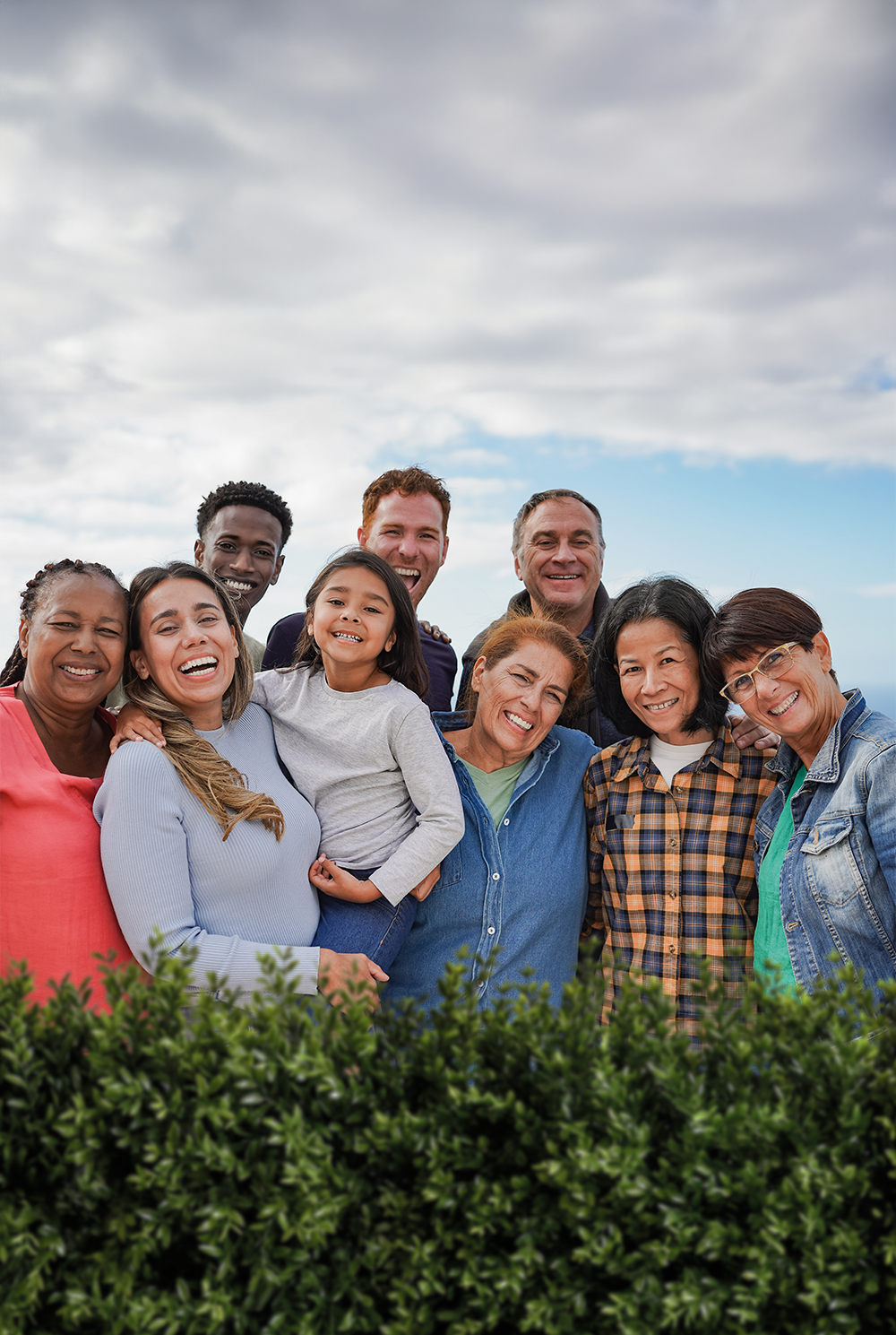 Friends and family smiling outside