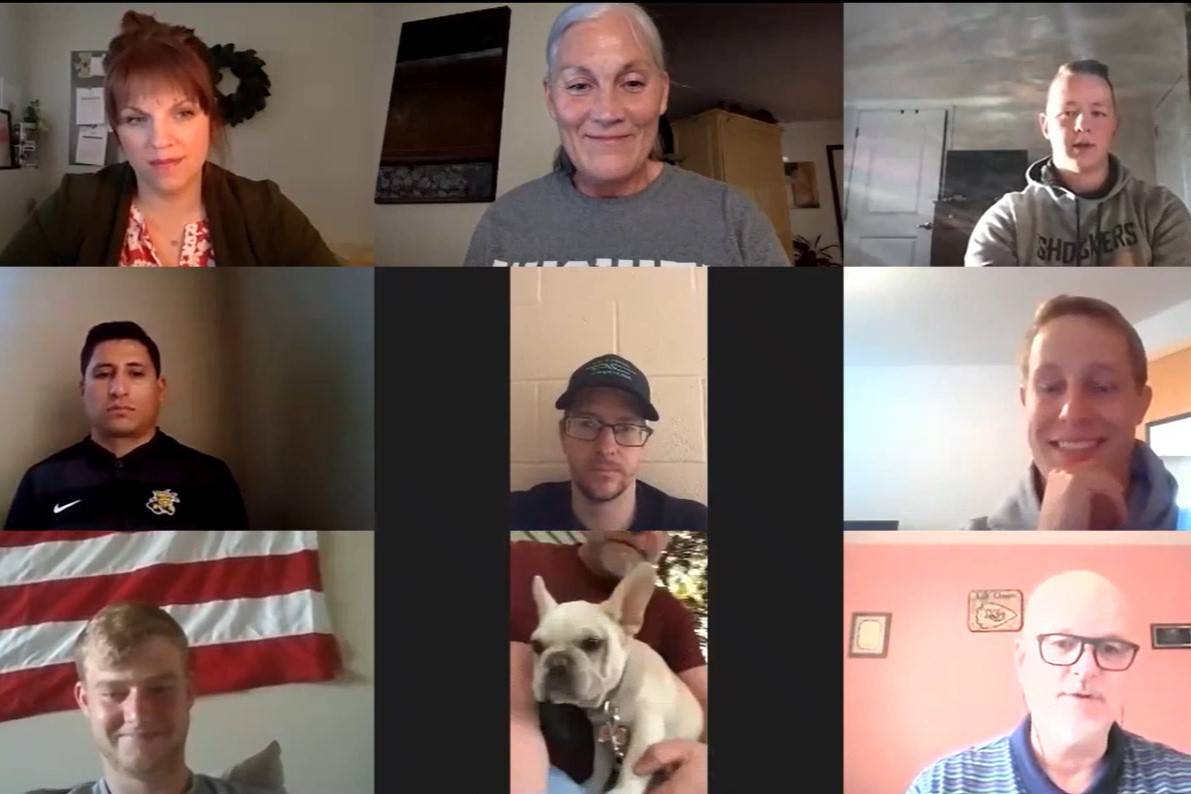 A screenshot from the webinar "Discovering Human Performance Studies". Eight people on a video call, arranged in a 3x3 grid, with one showing a small dog.
