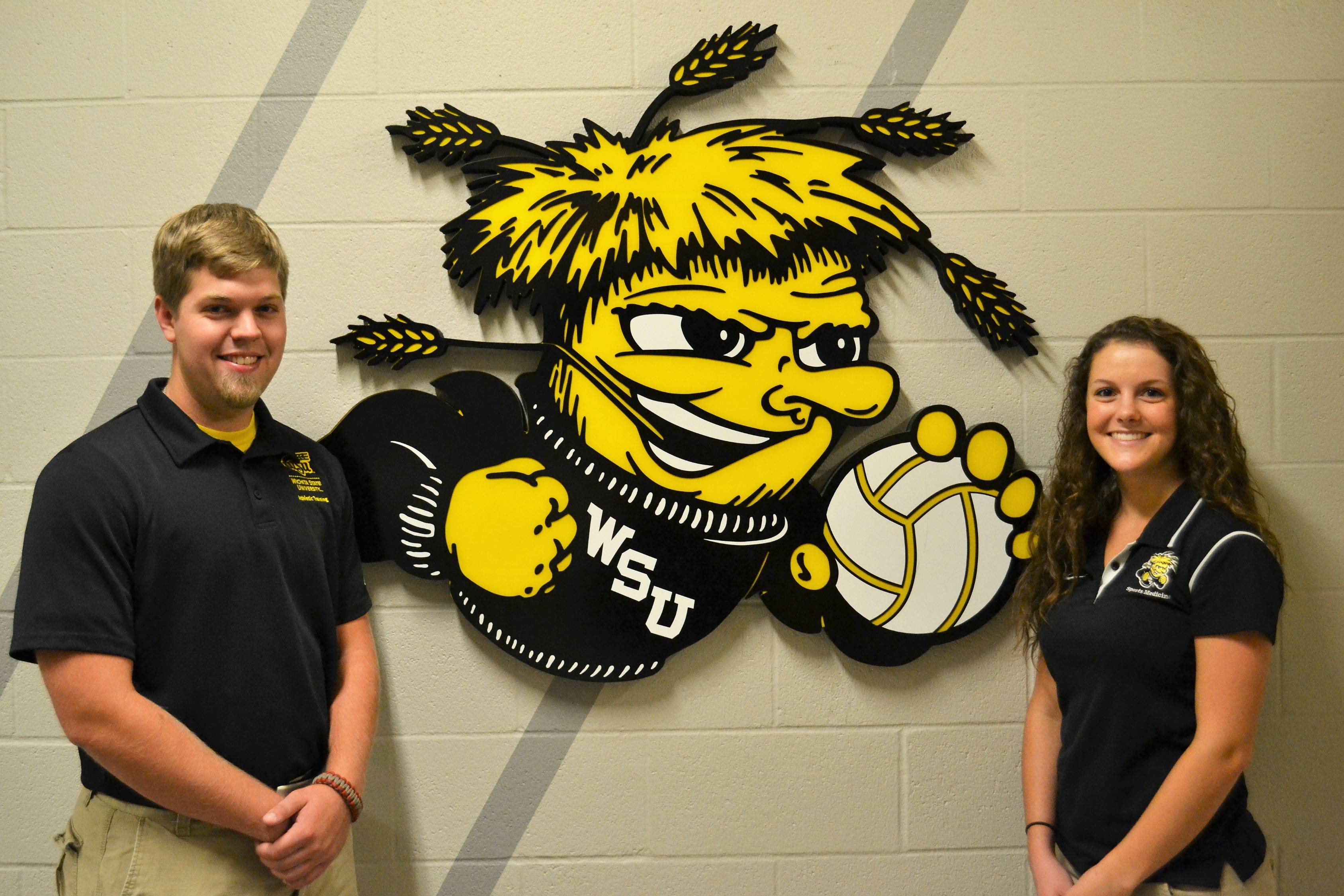 2 HPS students with WSU logo