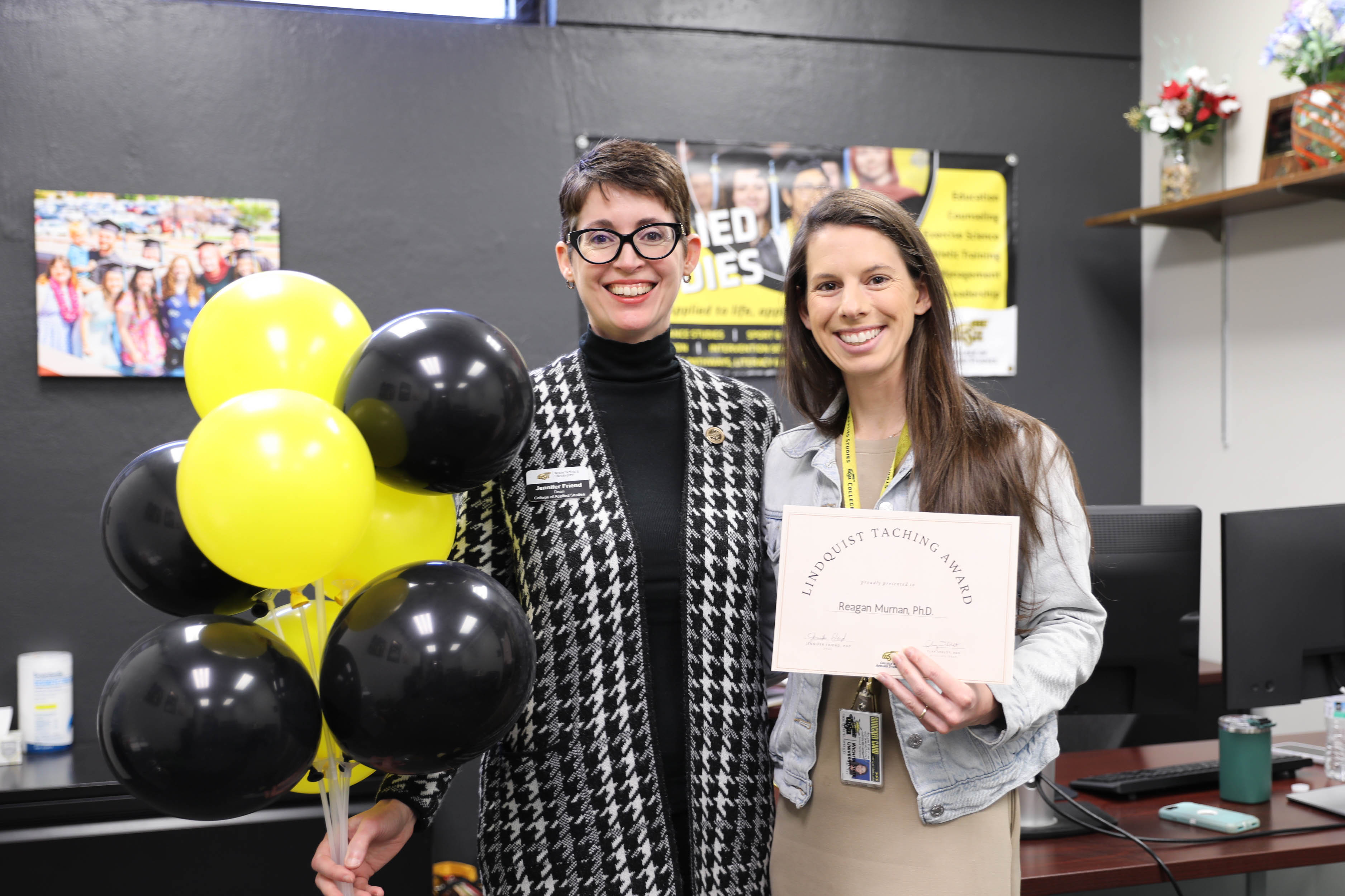Dean Friend with Young Faculty Scholar and Lindquist Teaching Award winner, Dr. Reagan Murnan