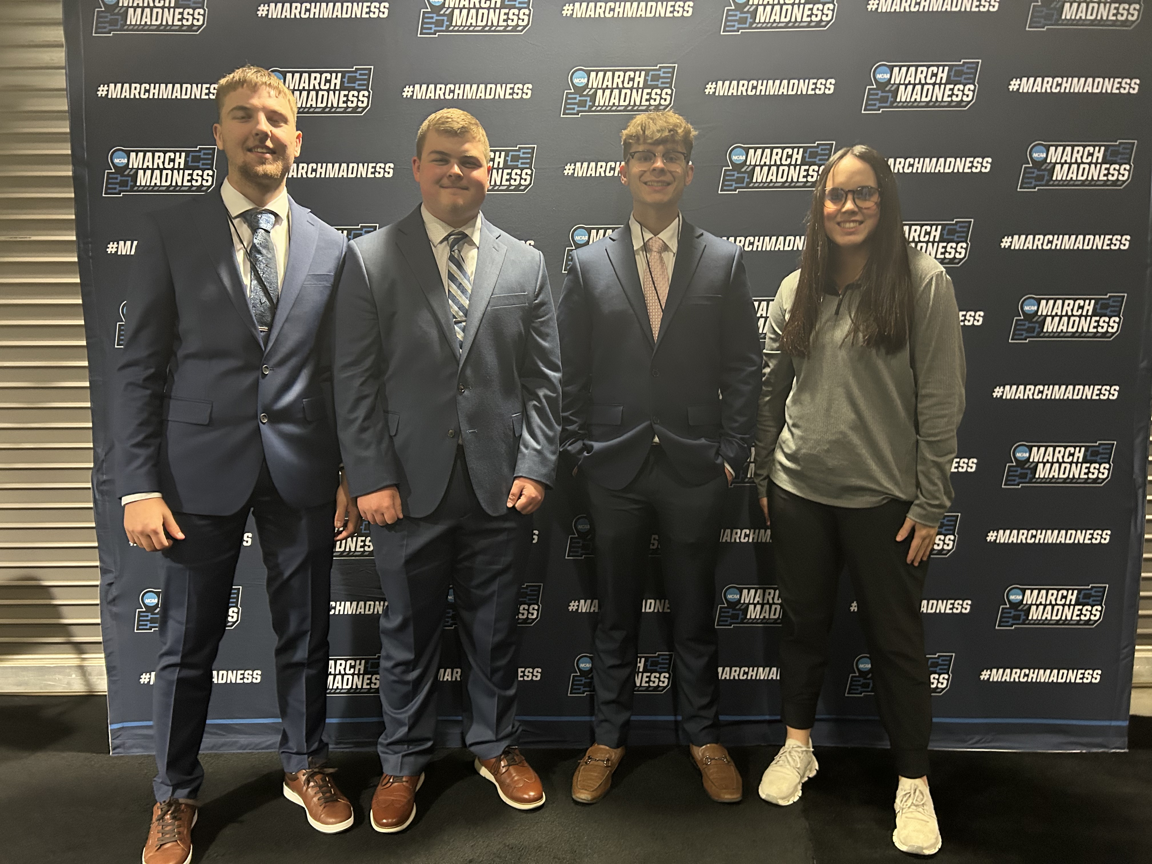 Liam Crawford with fellow sport management students during the 2025 NCAA Basketball Tournament in Wichita, KS