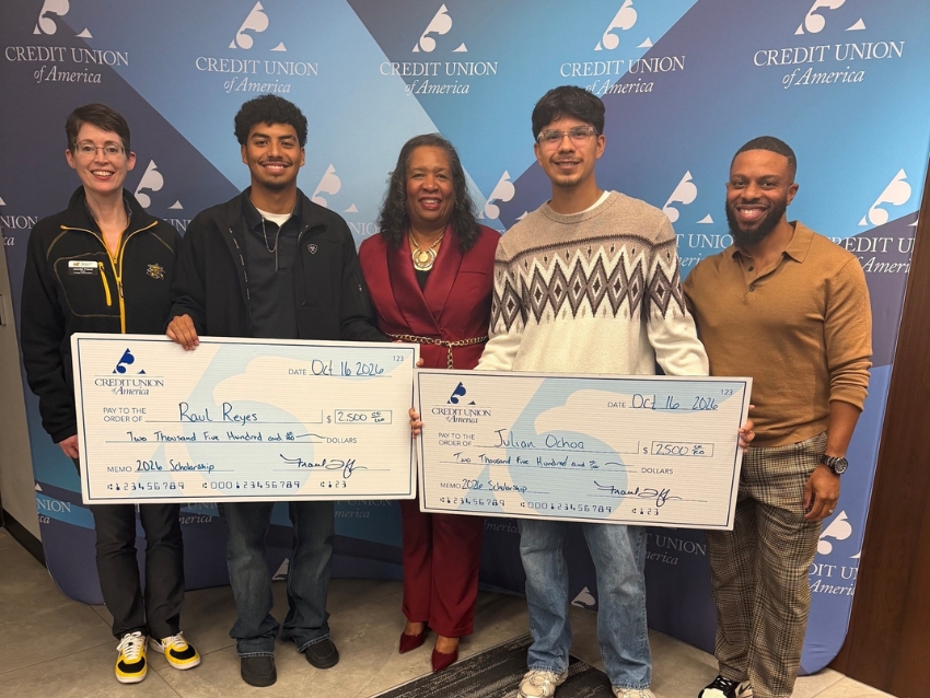 Credit Union of America scholarship recipients pose with representatives from Wichita State University while holding ceremonial scholarship checks during the 2026 scholarship celebration.