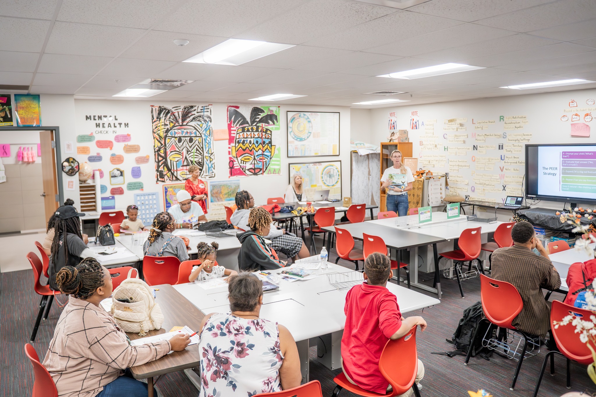 Dr. Kim Moody presenting to a group during a recent CLEAR event 