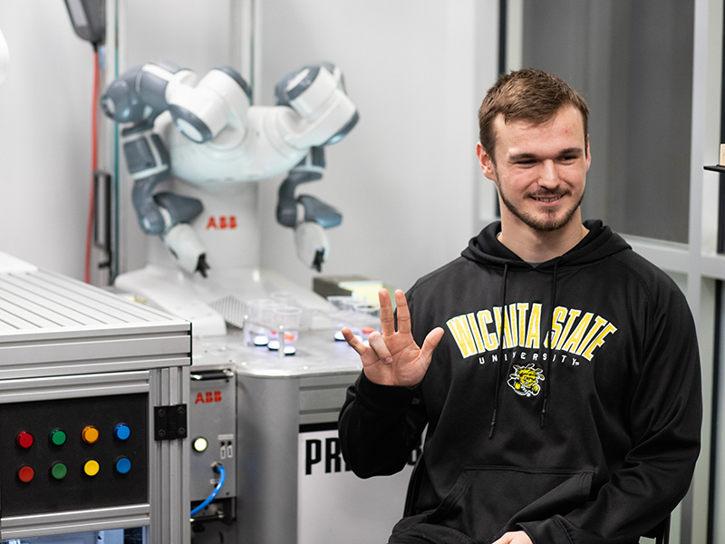 Industrial Automation and Robotics student in the robotics labs