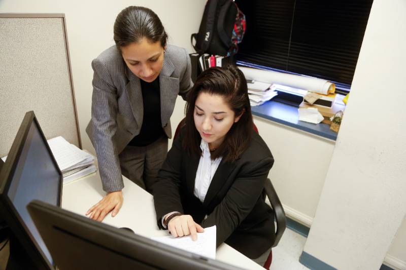 Two Female Faculty Members in Research Lab