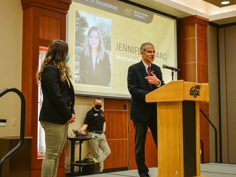 Graduating senior being honored with award