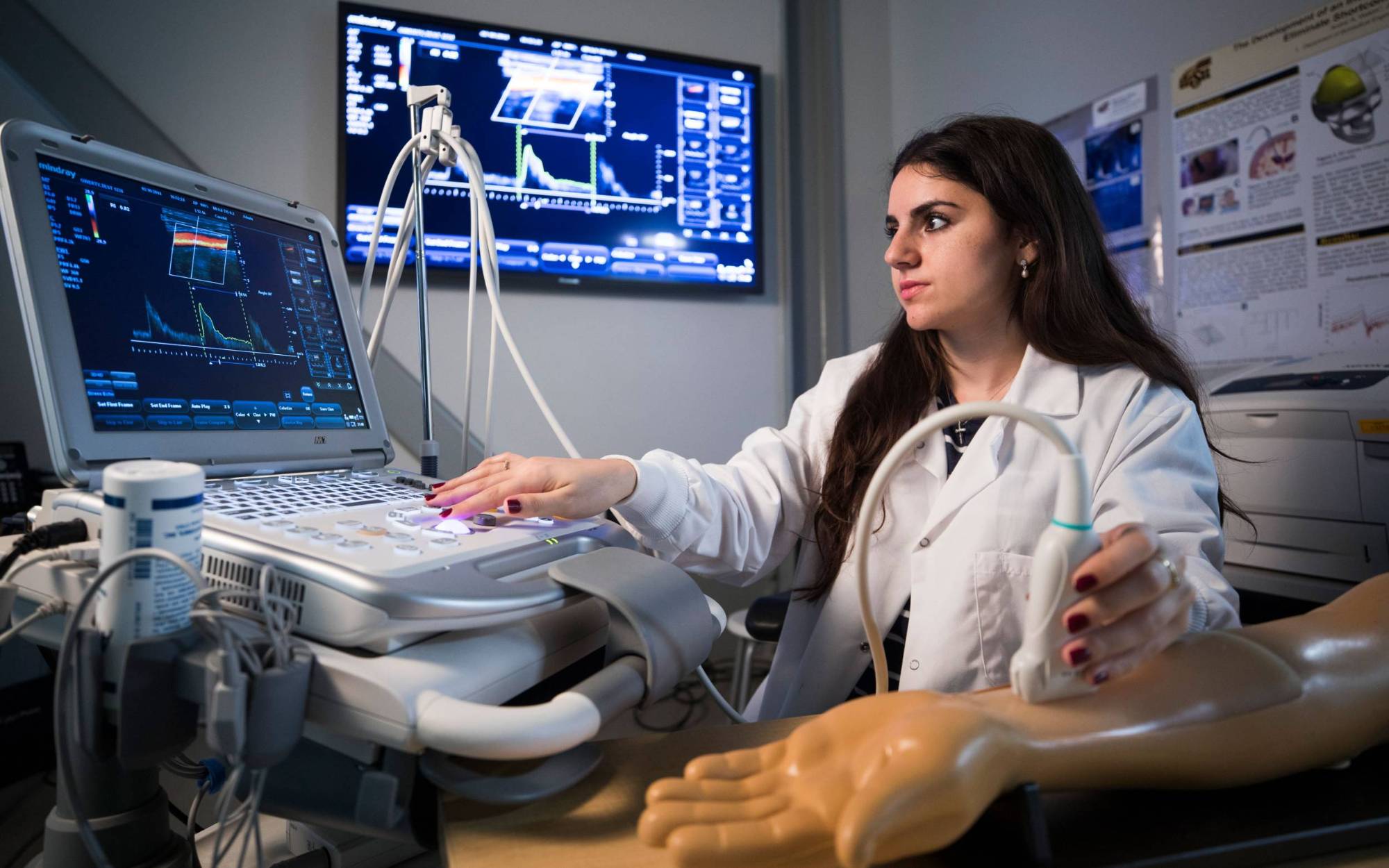 Female student in Biomedical Engineering lab.