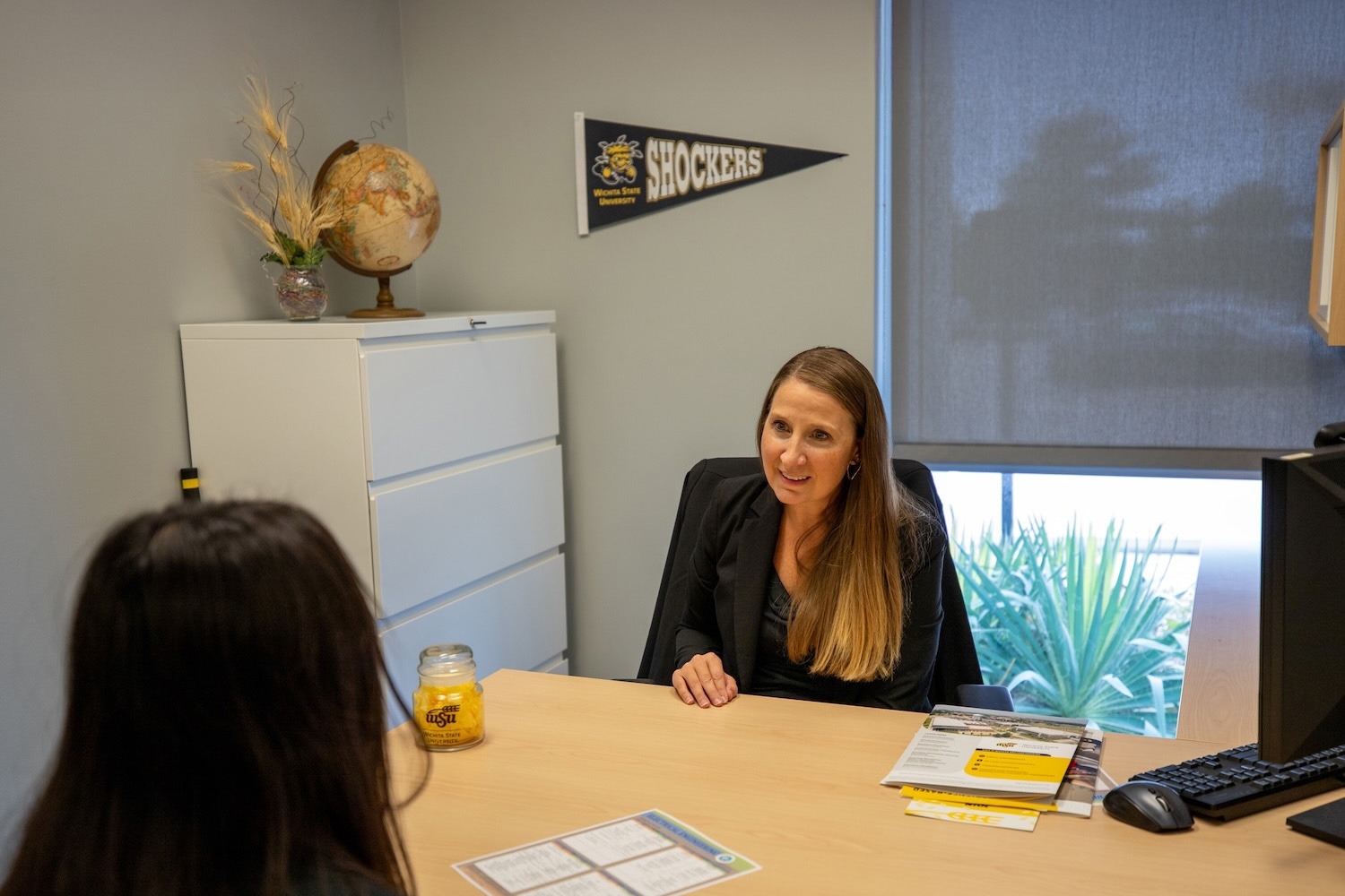 Director of Advising With Student