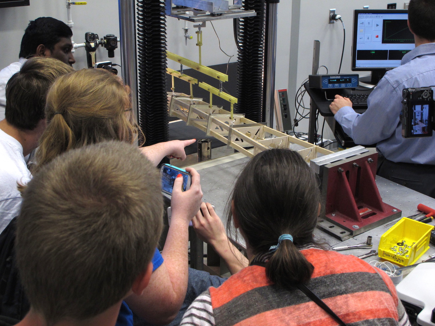 Students watch as their wingbox nears the breaking point.