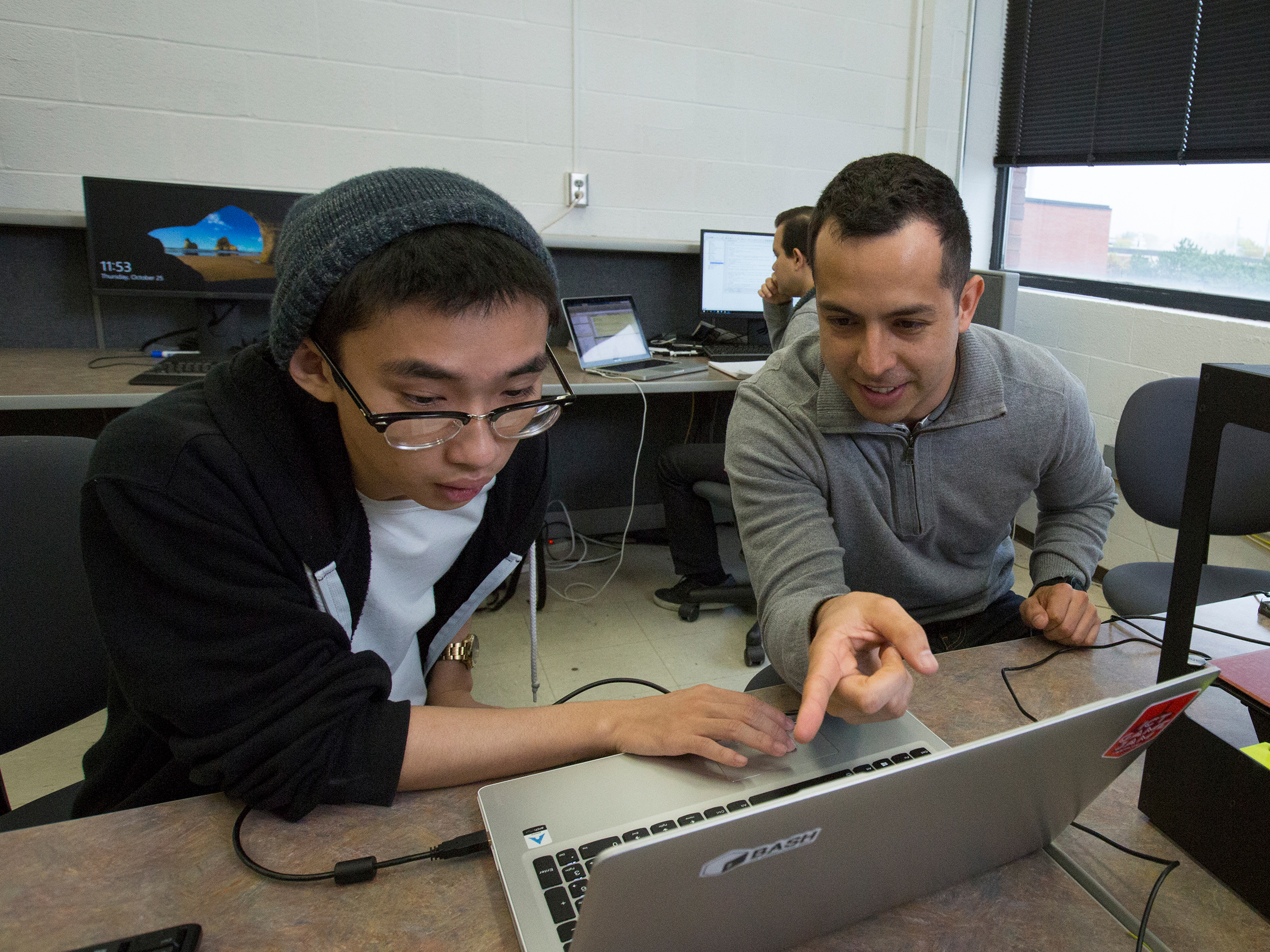 Students working together on a computer
