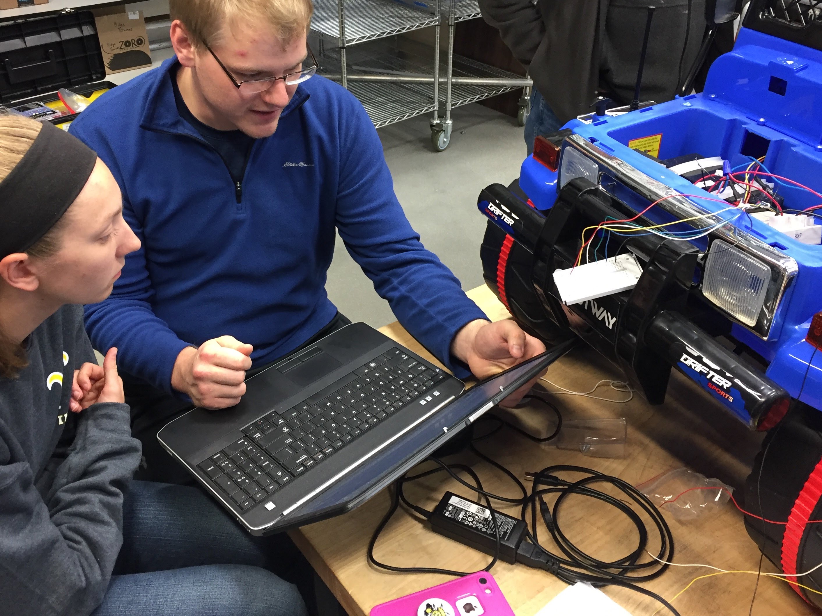 Students troubleshooting wiring