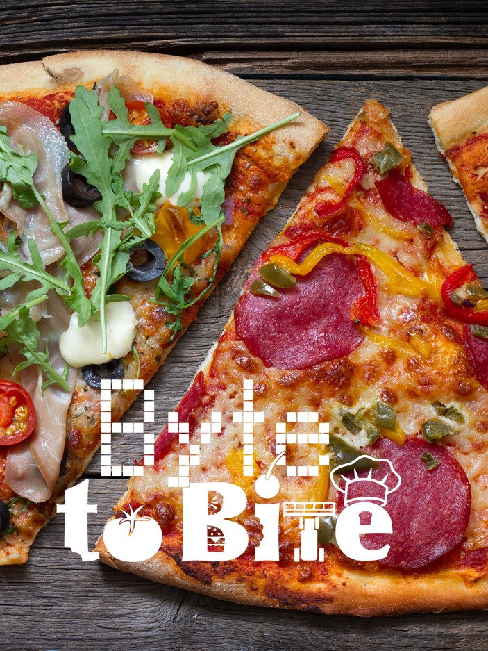 Game name Byte to Bit in front of 2 pieces of pizza
