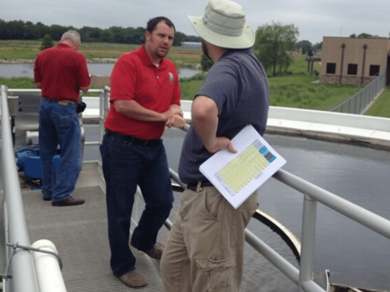 Nicholas Willis providing technical assistance to water utility