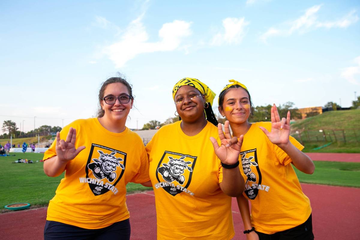 Three Fairmount College of Liberal Arts and Sciences students at Clash of the Colleges 2024.