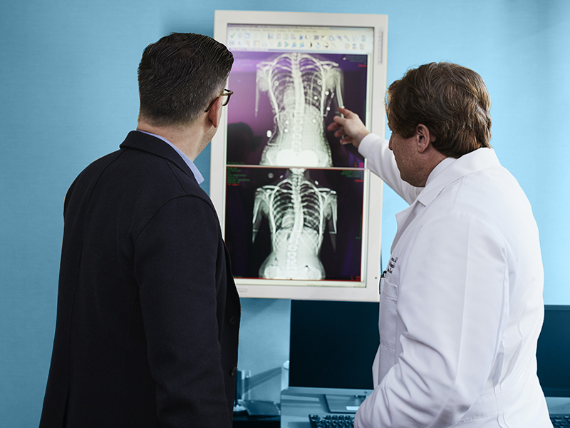 A doctor explaining an xray.