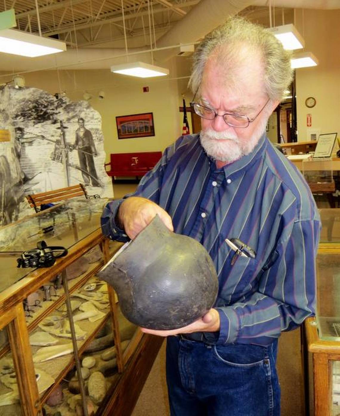 Blakeslee working with artifact