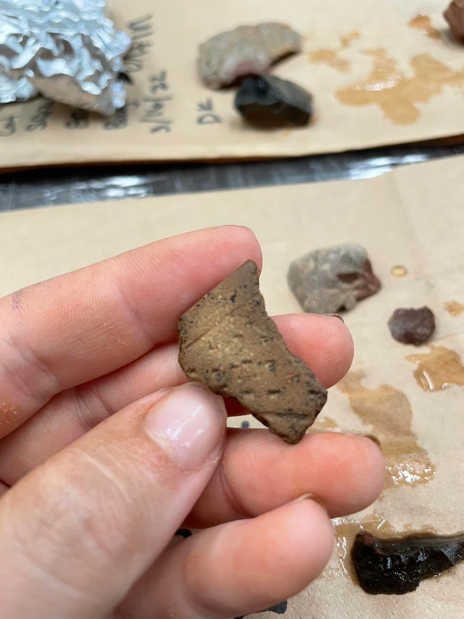 close up image of small decorated piece of pottery