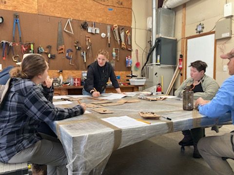 people around a square table