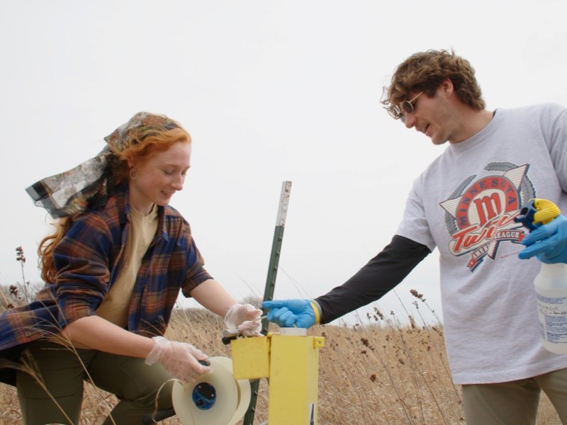 Students take measurements of the prairies on the reserve
