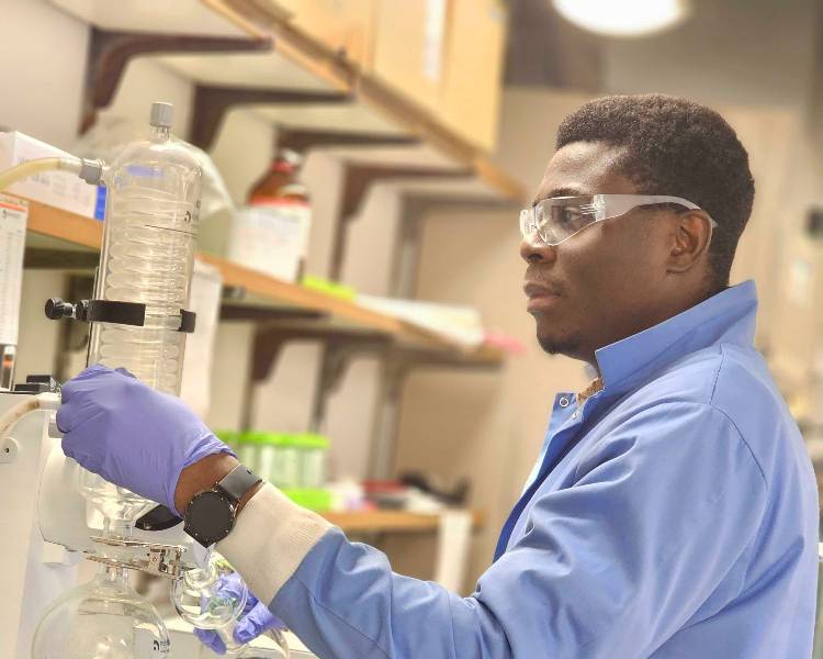 Graduate student using rotovap