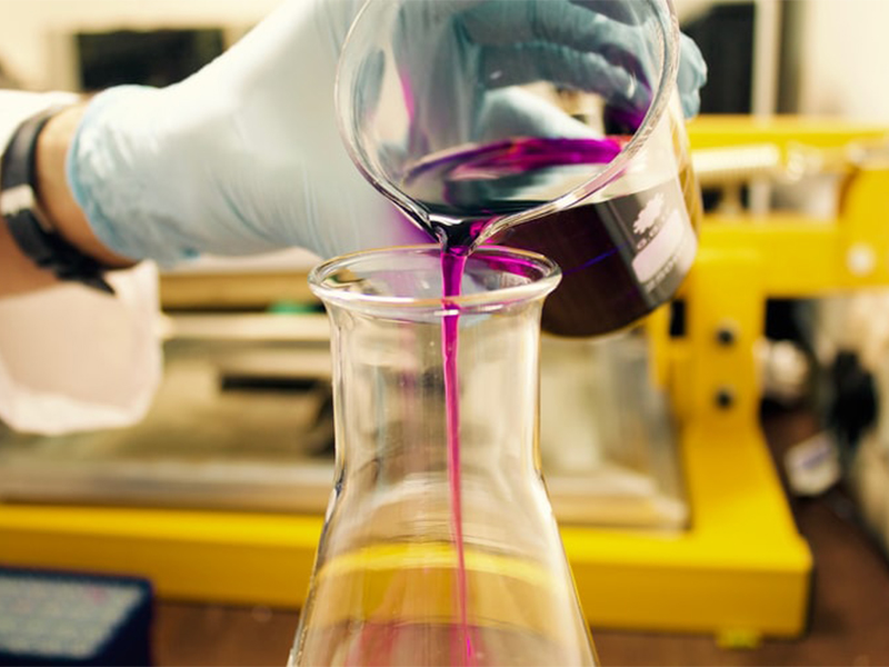 Student standing in chem lab