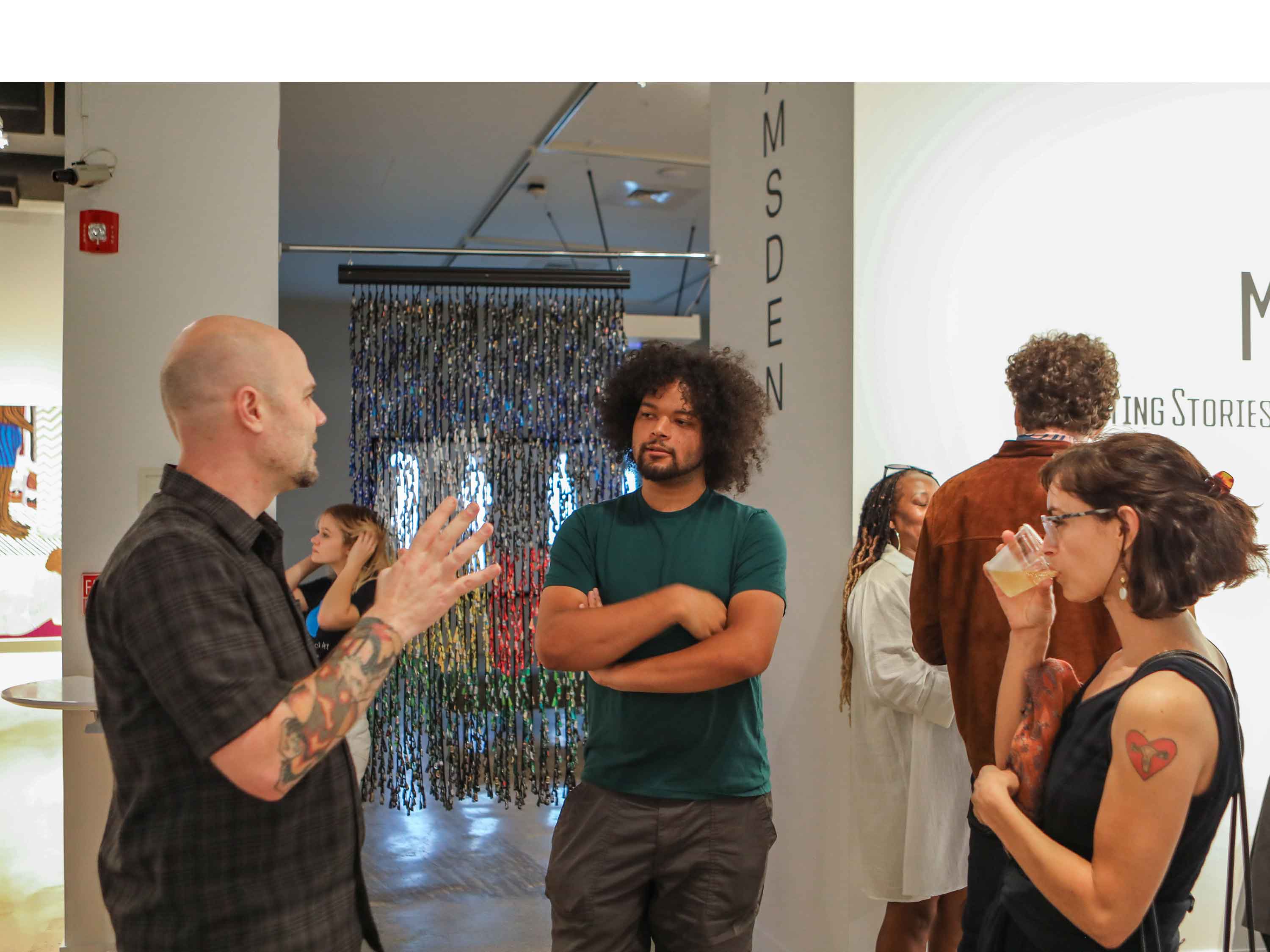 WSU Fiction Professor Jason Allen talking to students at the Ulrich Museum