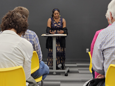 Zariah at a poetry reading in the lab