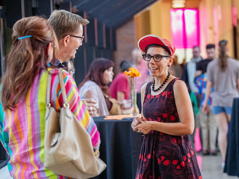 Attendees of the Ulrich Fall Exhibition opening socialize